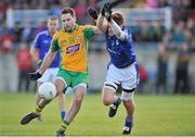 19 October 2014;  Kevin Murphy, Corofin, in action against Keelin Clancy, St Michael's. Galway County Senior Football Championship Final, Corofin v St Michael's, Tuam Stadium, Tuam, Co. Galway. Picture credit: Ray Ryan / SPORTSFILE