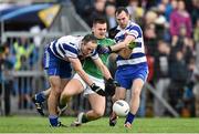 19 October 2014; Michael Deegan, Donaghmore/Ashbourne, in action against Shane Crosby, left, and Stephen O'Toole, Navan O'Mahonys. Meath County Senior Football Championship Final, Navan O'Mahonys v Donaghmore/Ashbourne, Páirc Tailteann, Navan, Co. Meath. Picture credit: Ramsey Cardy / SPORTSFILE