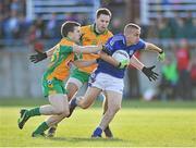 19 October 2014; Keith Ward, St Michael's, in action against Joe Canney and Kevin Murphy, Corofin. Galway County Senior Football Championship Final, Corofin v St Michael's, Tuam Stadium, Tuam, Co. Galway. Picture credit: Ray Ryan / SPORTSFILE