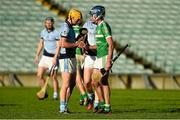 19 October 2014; Kilmallock's Gavin O'Mahony offers a handshake to Adrian Breen of Na Piarsaigh after the game. Limerick County Senior Hurling Championship Final, Na Piarsaigh v Kilmallock, Gaelic Grounds, Limerick. Picture credit: Diarmuid Greene / SPORTSFILE