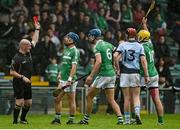 19 October 2014; Liam Walsh, Kilmallock, is shown a red card by referee Jason Mullins. Limerick County Senior Hurling Championship Final, Na Piarsaigh v Kilmallock, Gaelic Grounds, Limerick. Picture credit: Diarmuid Greene / SPORTSFILE