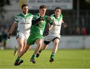 19 October 2014; Declan McKenna, Sarsfields, in action against Cian O'Connor, left, and Pádraig O'Flynn, Moorefield. Kildare County Senior Football Championship Final, Sarsfields v Moorefield, St Conleth's Park, Newbridge, Co. Kildare. Picture credit: Piaras Ó Mídheach / SPORTSFILE