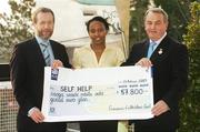 13 April 2007; GAA President Nickey Brennan, right, and former president Sean Kelly presented a cheque for 57,800 euro to Nancy Aburi of the well-merited charity &quot;Self Help&quot;. Hotel Kilkenny, College Road, Kilkenny. Picture credit: Matt Browne / SPORTSFILE