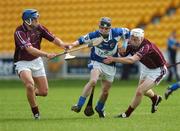 15 April 2007; Jason Phelan, Laois, in action against Brendan Murtagh, left, and Adam Price, Westmeath. Allianz National Hurling League, Division 2, Westmeath v Laois, O'Connor Park, Tullamore, Co. Offaly. Picture credit; Brian Lawless / SPORTSFILE