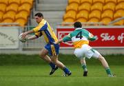 15 April 2007; Ger Heneghan, Roscommon, in action against Nigel Grennan, Offaly. Allianz National Football League, Division 2A, Offaly v Roscommon, O'Connor Park, Tullamore, Co. Offaly. Picture credit; Brian Lawless / SPORTSFILE