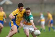 15 April 2007; Ger Rafferty, Offaly, in action against Karol Mannion, Roscommon. Allianz National Football League, Division 2A, Offaly v Roscommon, O'Connor Park, Tullamore, Co. Offaly. Picture credit; Brian Lawless / SPORTSFILE