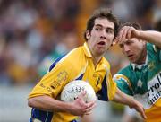 15 April 2007; David Hoey, Roscommon, in action against Richard Dooner, Offaly. Allianz National Football League, Division 2A, Offaly v Roscommon, O'Connor Park, Tullamore, Co. Offaly. Picture credit; Brian Lawless / SPORTSFILE
