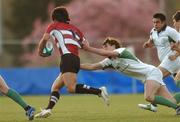 17 April 2007; Yasutaka Sasakura, Japan, is tackled by Murray Kinsella, Ireland. IRB U-19 World Cup, Division A, Ireland v Japan, Shaw's Bridge, Belfast, Co. Antrim. Picture credit; Paul Mohan / SPORTSFILE