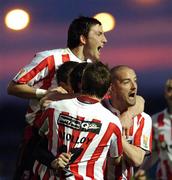 17 April 2007; Kevin Deery, hidden, Derry City, celebrates after scoring his side's first goal with team-mate's Barry Molloy, Killian Brennan, left and Dave Rogers, right. Setanta Cup Group 1, Drogheda United v Derry City, United Park, Drogheda, Co. Louth. Picture credit; David Maher / SPORTSFILE