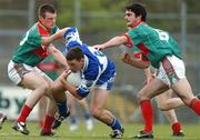 21 April 2007; John O'Loughlin, Laois, in action against Aidan Campbell, left, and David Kilcullen, Mayo. Cadbury All-Ireland U21 Football Championship Semi-Final, Mayo v Laois, Dr Hyde Park, Co. Roscommon. Picture credit; Paul Mohan / SPORTSFILE
