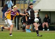 21 April 2007; Marion O'Donnell, Sligo, in action against Michelle Doyle, Wexford. Suzuki Ladies National Football League Division 2 Semi-Final, Sligo v Wexford, Banagher, Co. Offaly. Picture credit; Matt Browne / SPORTSFILE