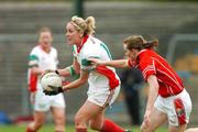 21 April 2007; Ciara McDermot, Mayo, in action against Briege Corkery, Cork. Suzuki Ladies National Football League Division 1 Semi-Final, Cork v Mayo, Banagher, Co. Offaly. Picture credit; Matt Browne / SPORTSFILE