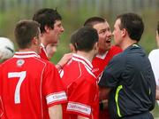 21 April 2007; Referee Adrian McCourt gets surrounded by Cliftonville players after he gave a penalty against them. Carnegie Premier League, Cliftonville v Glentoran, Solitude, Belfast, Co. Antrim. Picture credit; Russell Pritchard / SPORTSFILE