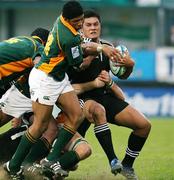 21 April 2007; Robert Fruean, New Zealand, is tackled by Bernado Botha, South Africa. IRB U19 World Cup Final, South Africa v New Zealand, Ravenhill Park, Belfast, Co. Antrim. Picture credit: Oliver McVeigh / SPORTSFILE