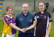 21 April 2007; Referee Derek Byrne oversees Martina Murray, Wexford, shake hands with Sligo's Bernice Byrne before the game. Suzuki Ladies National Football League Division 2 Semi-Final, Sligo v Wexford, Banagher, Co. Offaly. Picture credit; Matt Browne / SPORTSFILE