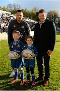 19 October 2014; Matchday mascots Ruairí Houlihan and Lucy Bateson with Leinster's Ben Te'o and Fergus McFadden ahead of the game. European Rugby Champions Cup 2014/15, Pool 2, Round 1, Leinster v Wasps, RDS, Ballsbridge, Dublin. Picture credit: Stephen McCarthy / SPORTSFILE