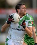 19 October 2014; Cian O'Connor, Moorefield, in action against Ray Cahill, Sarsfields. Kildare County Senior Football Championship Final, Sarsfields v Moorefield, St Conleth's Park, Newbridge, Co. Kildare. Picture credit: Piaras Ó Mídheach / SPORTSFILE