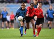 23 October 2014; Alex English, St. Mary's BNS, Booterstown, son of Tipperary hurling legend Nicky English, in action against Mustaf Ali Hassa and Brandon Hennessy, right, St. Patrick's SNS, Corduff. Allianz Cumann na mBunscol Finals, Croke Park, Dublin. Picture credit: Pat Murphy / SPORTSFILE