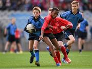 23 October 2014; Alex English, St. Mary's BNS, Booterstown, son of Tipperary hurling legend Nicky English, in action against Mustaf Ali Hassa and Brandon Hennessy, partially hidden, St. Patrick's SNS, Corduff. Allianz Cumann na mBunscol Finals, Croke Park, Dublin. Picture credit: Pat Murphy / SPORTSFILE