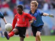 23 October 2014; Warith Omotoso, St. Patrick's SNS, Corduff, in action against Alex O'Meara, St. Mary's BNS, Booterstown, during the Sciath Clanna Gael Final. Allianz Cumann na mBunscol Finals, Croke Park, Dublin. Picture credit: Pat Murphy / SPORTSFILE