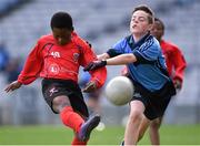 23 October 2014; Warith Omotoso, St. Patrick's SNS, Corduff, in action against Conor Moriarty, St. Mary's BNS, Booterstown, during the Sciath Clanna Gael Final. Allianz Cumann na mBunscol Finals, Croke Park, Dublin. Picture credit: Pat Murphy / SPORTSFILE