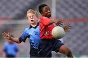 23 October 2014; David Loye, St. Patrick's SNS, Corduff, in action against Hugo McLaughlin, St. Mary's BNS, Booterstown, during the Sciath Clanna Gael Final. Allianz Cumann na mBunscol Finals, Croke Park, Dublin. Picture credit: Pat Murphy / SPORTSFILE