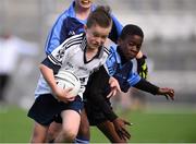23 October 2014; Fionn Murray, St. Martin De Porres, Aylesbury, in action against Kenny Ogundipe, Scoil Aine, Fettercairn, during the Corn Matt Griffin final. Allianz Cumann na mBunscol Finals, Croke Park, Dublin. Picture credit: Pat Murphy / SPORTSFILE