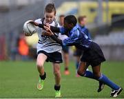 23 October 2014; Fionn Murray, St. Martin De Porres, Aylesbury, in action against Kenny Ogundipe, Scoil Aine, Fettercairn, during the Corn Matt Griffin final. Allianz Cumann na mBunscol Finals, Croke Park, Dublin. Picture credit: Pat Murphy / SPORTSFILE