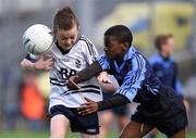 23 October 2014; Fionn Murray, St. Martin De Porres, Aylesbury, in action against Kenny Ogundipe, Scoil Aine, Fettercairn, during the Corn Matt Griffin final. Allianz Cumann na mBunscol Finals, Croke Park, Dublin. Picture credit: Pat Murphy / SPORTSFILE