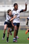 23 October 2014; John Bosco Ezidinma and Jordon O'Reilly, left, St. Martin De Porres, Aylesbury, celebrate at the final whistle after winning the Corn Matt Griffin final. Allianz Cumann na mBunscol Finals, Croke Park, Dublin. Picture credit: Pat Murphy / SPORTSFILE