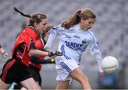 23 October 2014; Lauren Kearney, Bishop Galvin NS, Templeogue, in action against Rebecca Keane, St Colmcille's SNS, Knocklyon, left, during the Austin Finn Shield final. Allianz Cumann na mBunscol Finals, Croke Park, Dublin. Picture credit: Pat Murphy / SPORTSFILE