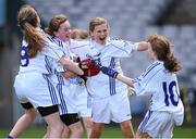 23 October 2014; Bishop Galvin NS, Templeogue, players, from left, Roisin Connolly, Una Nerney, Lauren Kearney and Caoimhe McKeown celebrate at the final whistle after winning the Austin Finn Shield final. Allianz Cumann na mBunscol Finals, Croke Park, Dublin. Picture credit: Pat Murphy / SPORTSFILE