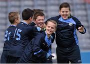 23 October 2014; Eoin Gannon, Mary Queen of Angels, Ballyfermot, third from left, is surrounded by his team-mates after scoring a goal against St. Mary's NS, Saggart, during the Sciath O Donnchu final. Allianz Cumann na mBunscol Finals, Croke Park, Dublin. Picture credit: Pat Murphy / SPORTSFILE