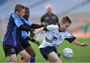 23 October 2014; Fionn Murray, St. Martin De Porres, Aylesbury, in action against Kyle Berney, left, and Kenny Ogundipe, Scoil Aine, Fettercairn, right, during the Corn Matt Griffin final. Allianz Cumann na mBunscol Finals, Croke Park, Dublin. Picture credit: Marcus Roche / SPORTSFILE