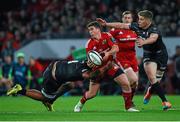 24 October 2014; Ian Keatley, Munster, is tackled by Billy Vunipola, left, and Owen Farrell, Saracens. European Rugby Champions Cup 2014/15, Pool 1, Round 2, Munster v Saracens, Thomond Park, Limerick. Pictuer credit: Diarmuid Greene / SPORTSFILE