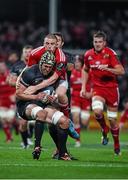 24 October 2014; Kelly Brown, Saracens, is tackled by Andrew Conway, Munster. European Rugby Champions Cup 2014/15, Pool 1, Round 2, Munster v Saracens, Thomond Park, Limerick. Pictuer credit: Diarmuid Greene / SPORTSFILE