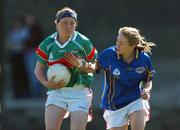 18 April 2007; Carly Shanahan, Loreto, Fermoy, in action against Laura Corrigan, St. Leo's, Carlow. Pat The Baker Post Primary Schools All-Ireland Senior A Finals, St. Leo's, Carlow v Loreto, Fermoy, Cork, Leahy Park, Cashel, Co. Tipperary. Picture credit: David Maher / SPORTSFILE