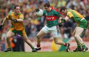 22 April 2007; Keith Higgins, Mayo, in action against Brendan Devenney, left, and Ciaran Bonner, Mayo. Allianz National Football League, Division 1 Final, Mayo v Donegal, Croke Park, Dublin. Picture credit: Pat Murphy / SPORTSFILE