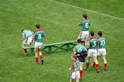 22 April 2007; The Mayo players make their way to the bench for the team picture. Allianz National Football League, Division 1, Final, Mayo v Donegal, Croke Park, Co. Dublin. Picture credit: Ray McManus / SPORTSFILE