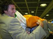 24 April 2007; Ireland's Kyle McCallan covers Jeremy Bray in the tri-colour on the teams return from the ICC 2007 Cricket World Cup. Dublin Airport, Dublin. Picture credit: Pat Murphy / SPORTSFILE