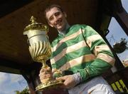 26 April 2007; Jockey John Thomas McNamara celebrates with the cup after his mount Spot Thedifference won the Avon Ri Corporate & Leisure Resort Cross Country Steeplechase. Punchestown National Hunt Festival, Punchestown Racecourse, Co. Kildare. Picture credit: Pat Murphy / SPORTSFILE