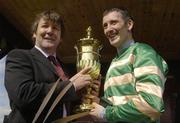 26 April 2007; Jockey John Thomas McNamara and trainer Enda Bolger celebrate with the cup after Spot Thedifference won the Avon Ri Corporate & Leisure Resort Cross Country Steeplechase. Punchestown National Hunt Festival, Punchestown Racecourse, Co. Kildare. Picture credit: Pat Murphy / SPORTSFILE