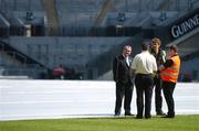 26 April 2007; President of the GAA Nickey Brennan, left, in conversation with ground staff during improvement work on the pitch at Croke Park. Croke Park, Dublin. Picture credit: Brendan Moran / SPORTSFILE