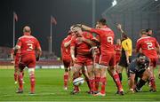24 October 2014; Dave Kilcoyne, Munster, is congratulated by teammates after scoring his side's first try of the game. European Rugby Champions Cup 2014/15, Pool 1, Round 2, Munster v Saracens, Thomond Park, Limerick. Pictuer credit: Matt Browne / SPORTSFILE