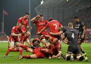 24 October 2014; Munster players celebrate after Dave Kilcoyne scores their side's first try of the game. European Rugby Champions Cup 2014/15, Pool 1, Round 2, Munster v Saracens, Thomond Park, Limerick. Pictuer credit: Matt Browne / SPORTSFILE