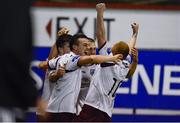 24 October 2014; Galway United's Marc Ludden, left, celebrates with goalscorer Jake Keegan, centre, and  and Ryan Connolly after their second goal of the game. SSE Airtricity League Division One Playoff 2, Shelbourne FC v Galway United, Tolka Park, Dublin. Picture credit: Ray Lohan / SPORTSFILE