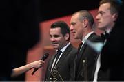 24 October 2014; Paul Durcan, Donegal, in the company of Kieran Donaghy, Kerry, centre and Cillian O'Connor, Mayo, is interviewed during the 2014 GAA GPA All-Star Awards, sponsored by Opel. Convention Centre, Dublin.  Picture credit: Brendan Moran / SPORTSFILE