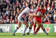 25 October 2014; Maxime Mermoz, RC Toulon, is tackled by Franco Van Der Merwe, left, and Andy Warwick, Ulster. European Rugby Champions Cup 2014/15, Pool 3, Round 2, Ulster v RC Toulon, Kingspan Stadium, Ravenhill Park, Belfast, Co. Antrim. Picture credit: Ramsey Cardy / SPORTSFILE