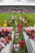 25 October 2014; Both teams run onto the pitch ahead of the game. European Rugby Champions Cup 2014/15, Pool 3, Round 2, Ulster v RC Toulon, Kingspan Stadium, Ravenhill Park, Belfast, Co. Antrim. Picture credit: Ramsey Cardy / SPORTSFILE