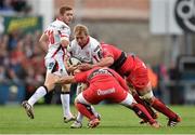 25 October 2014; Roger Wilson, Ulster, is tackled by Guilhem Guirado, left, and Juan Smith, RC Toulon. European Rugby Champions Cup 2014/15, Pool 3, Round 2, Ulster v RC Toulon, Kingspan Stadium, Ravenhill Park, Belfast, Co. Antrim. Picture credit: Ramsey Cardy / SPORTSFILE